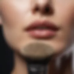 A close-up view of a double-sided face brush showcasing its intricate bristles.