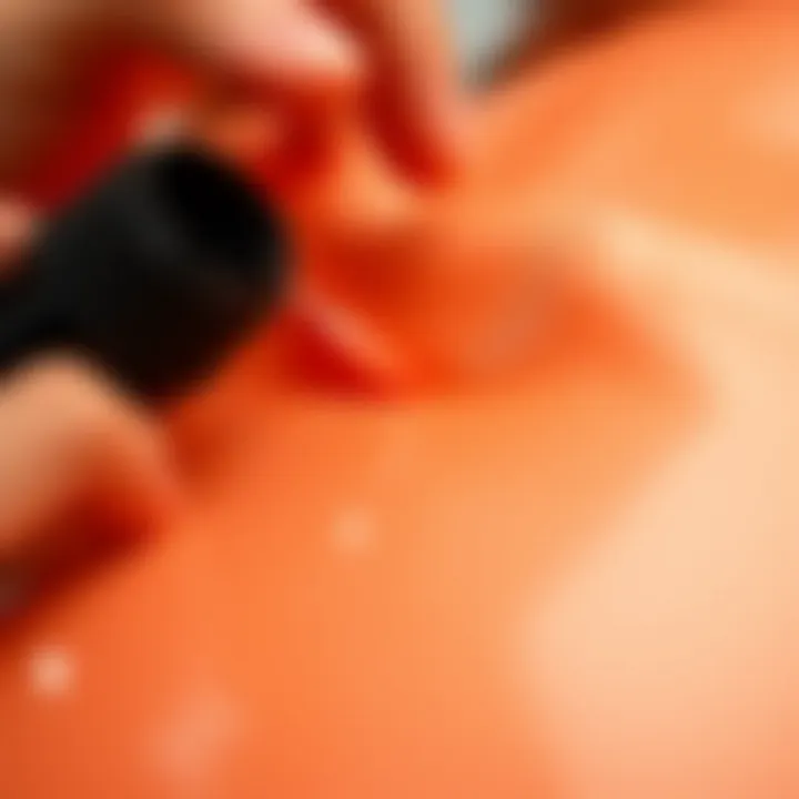 Close-up of balloon gloss spray application on fabric