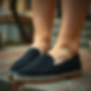 Craftsmanship of Black Canvas Espadrilles Close-up of the craftsmanship details of black canvas espadrilles flats