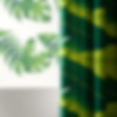 Close-up of green leaf pattern on shower curtain