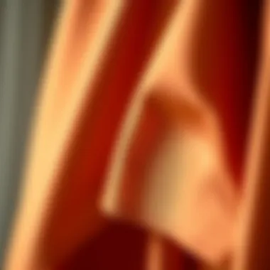 Close-up of fabric texture used in one shoulder asymmetrical hem dress