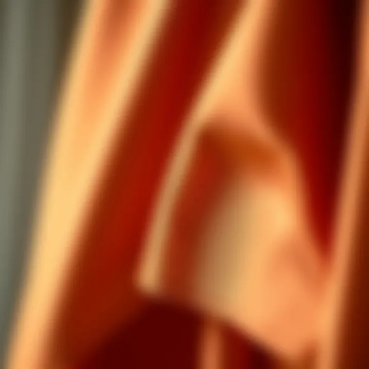 Close-up of fabric texture used in one shoulder asymmetrical hem dress