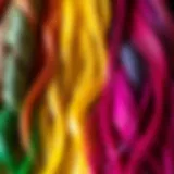 An array of colorful synthetic bulk hair strands showcasing different textures