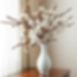 A stunning arrangement of real touch cherry blossom branches in an elegant vase