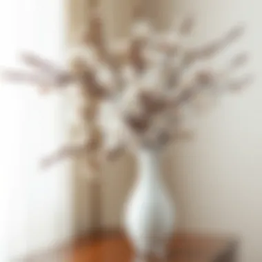 Elegant Cherry Blossom Arrangement A stunning arrangement of real touch cherry blossom branches in an elegant vase