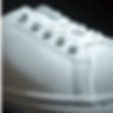 Close-up of white skate shoes highlighting design details and materials