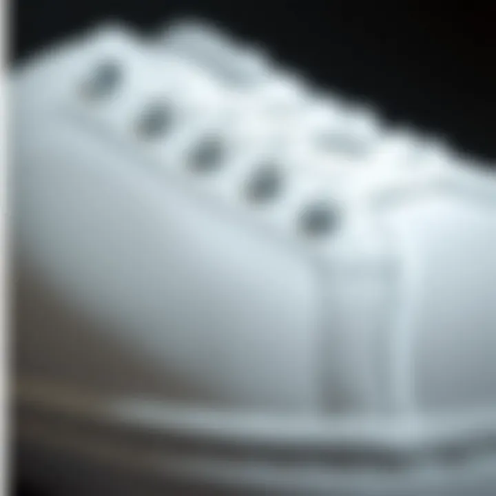Close-up of white skate shoes highlighting design details and materials