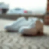 Stylish white skate shoes showcased on a textured surface