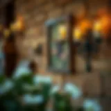 Elegant wrought iron wall candle holder in a rustic setting