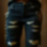 Vintage Goth Jeans with Studs A vintage pair of goth jeans adorned with metal studs and patches.