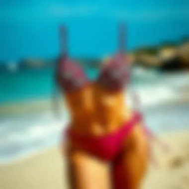 Trendy High Rise High Cut Bikini on Sandy Shore Stylish high rise high cut bikini display on a sandy beach