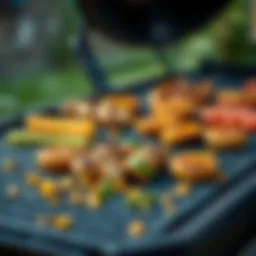 Close-up view of non-stick barbeque grill mat with food items