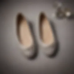 Elegant rhinestone ballet flats showcased on a luxurious fabric background.