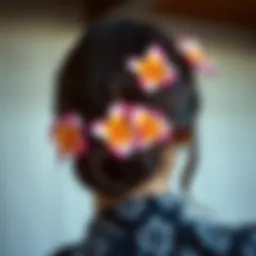 Vibrant plumeria flower clips adorning a stylish hairdo