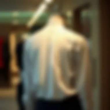 The Elegance of the Pleated Back Shirt Elegant pleated back shirt displayed on a mannequin