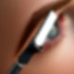 Close-up of an eyebrow razor showcasing its fine blade for precision grooming