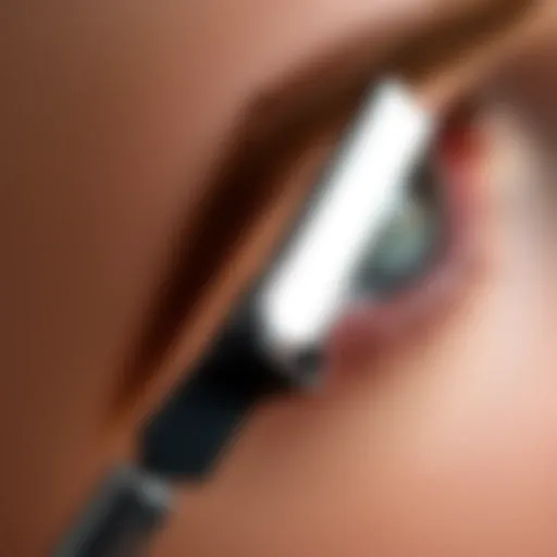 Close-up of an eyebrow razor showcasing its fine blade for precision grooming