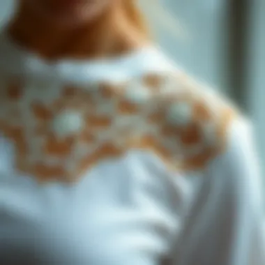 Close-up of intricate lace detail on a t-shirt