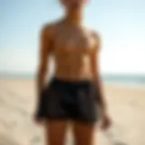 Stylish mesh swim shorts on a sandy beach