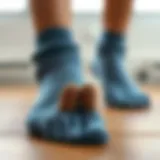 A close-up view of toe separator socks highlighting their unique design and material