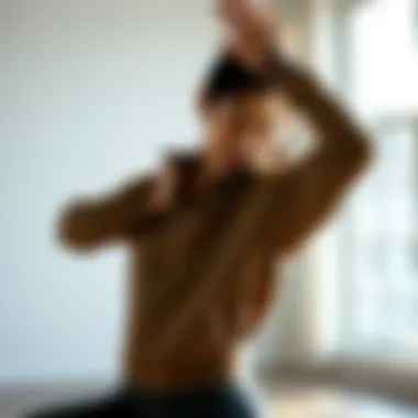 Movement and Flexibility in Yoga Practice Yoga practitioner wearing a jacket demonstrating movement and flexibility